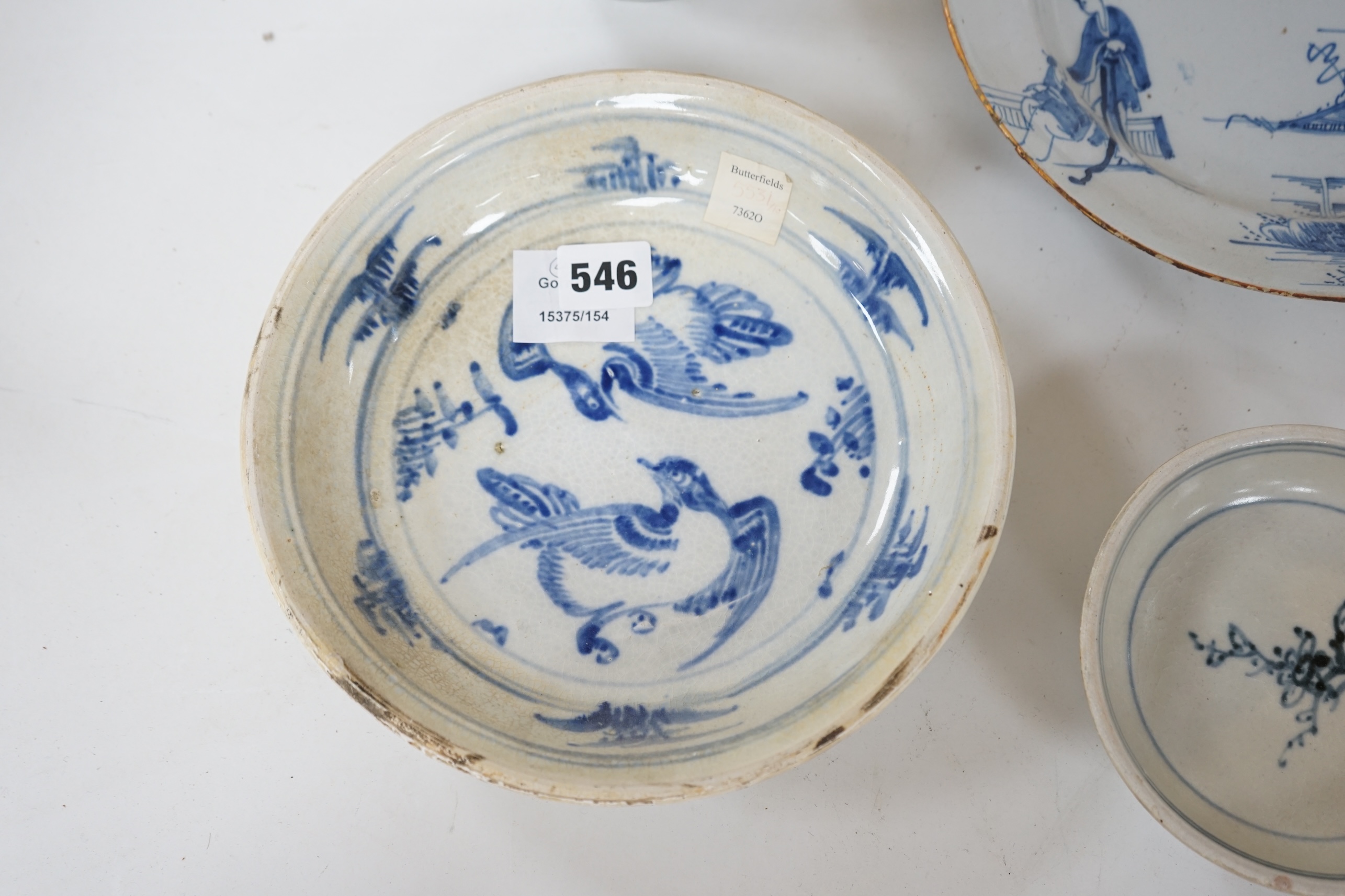 Three 15th century pieces from the Saga Visal Hoi-an hoard Vietnamese shipwreck and a delft dish, 26cm. Condition - commensurate with age